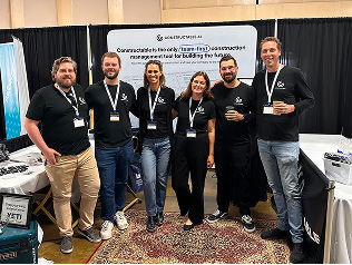 A photo of the Constructable team at their booth during a tradeshow